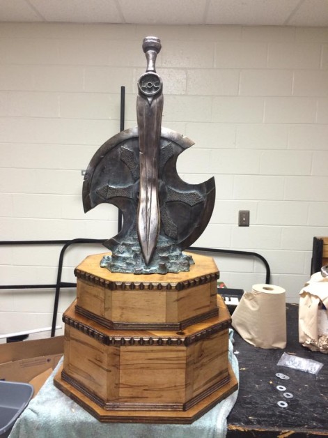 I was commissioned to build a custom trophy base for our local high school band. It will be the grand champion trophy in a marching band competition in October. The trophy itself was designed and poured by a local artist. I made the base out of ambrosia maple, cedar, and birch.