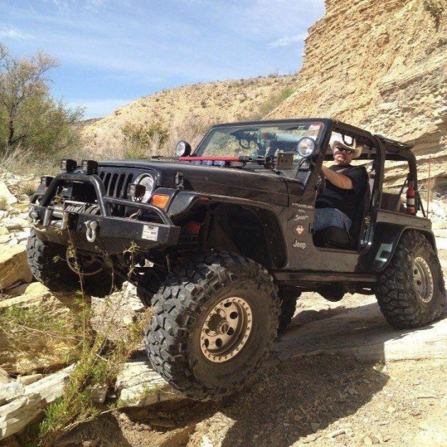 From Mickey Perritt: Me and Max, my 2000 TJ.