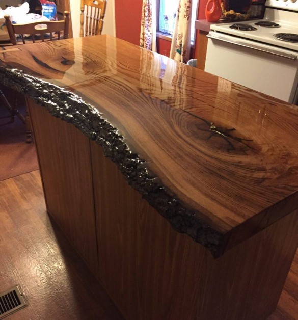 From Jake Harmon: I made this island top out of a slab of red oak with a epoxy finish.