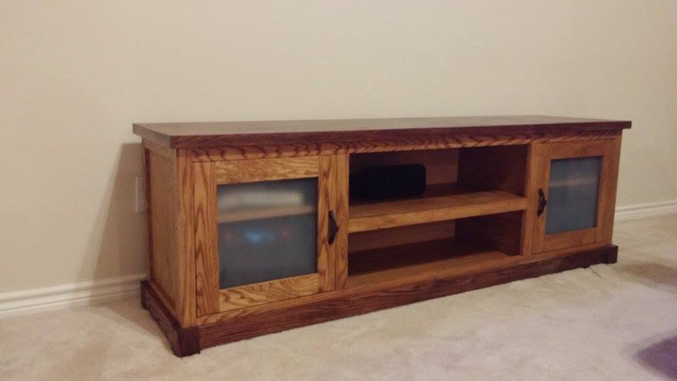 From Bill Barstow: Just finished up this 6' TV stand. It's made from live oak and red oak for the man cabinet.