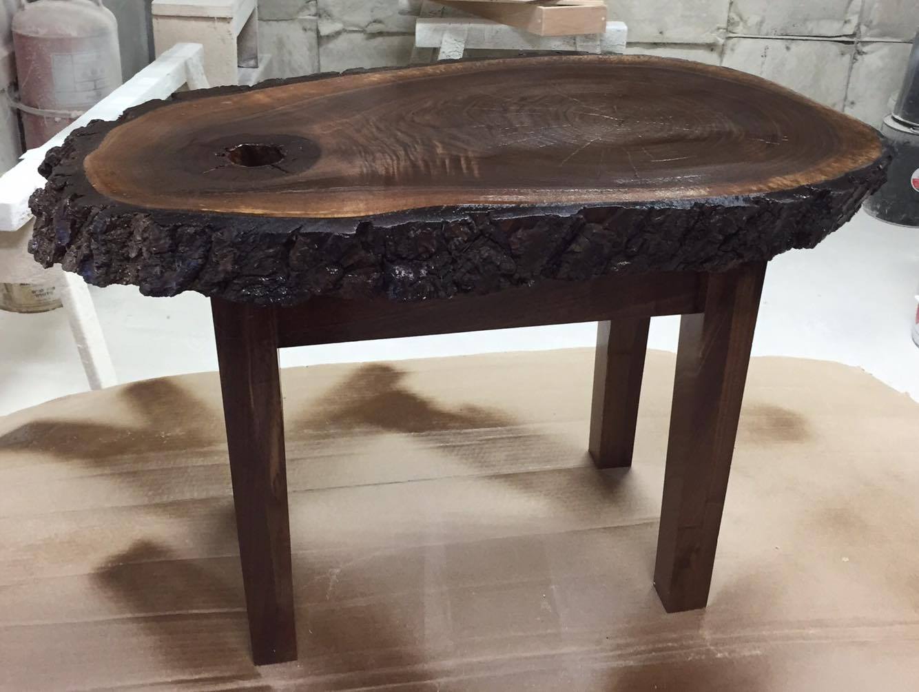 From Julie Kinsley: This is a solid walnut table I designed and built. Over the course of several days I sanded and smoothed and prepped the top surface , and then fabricated the legs of the table after that.
