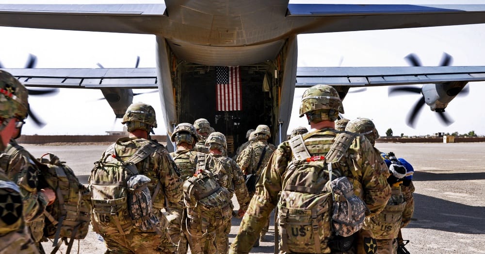 Soldiers leave Afghanistan to head for Joint Base Lewis-McChord / Via the U.S. Navy and Lt. Chad A. Dulac