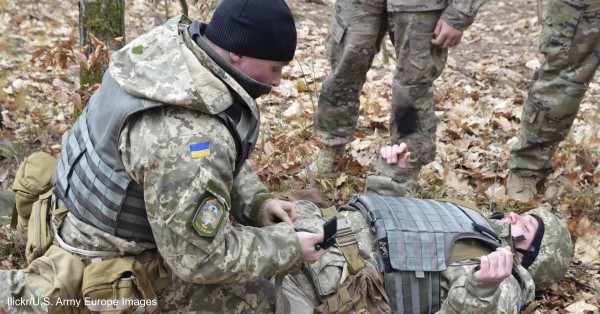 Soldiers with the Ukrainian Land Forces practice on how to apply a tourniquet.