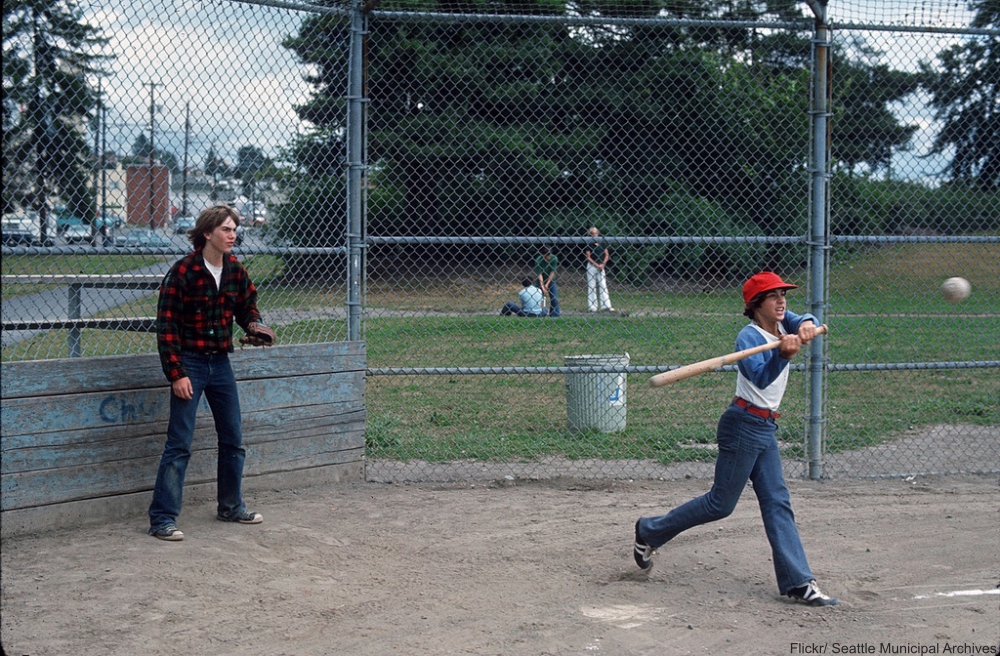 Kids playing Baseball at a Park Circa 1970s