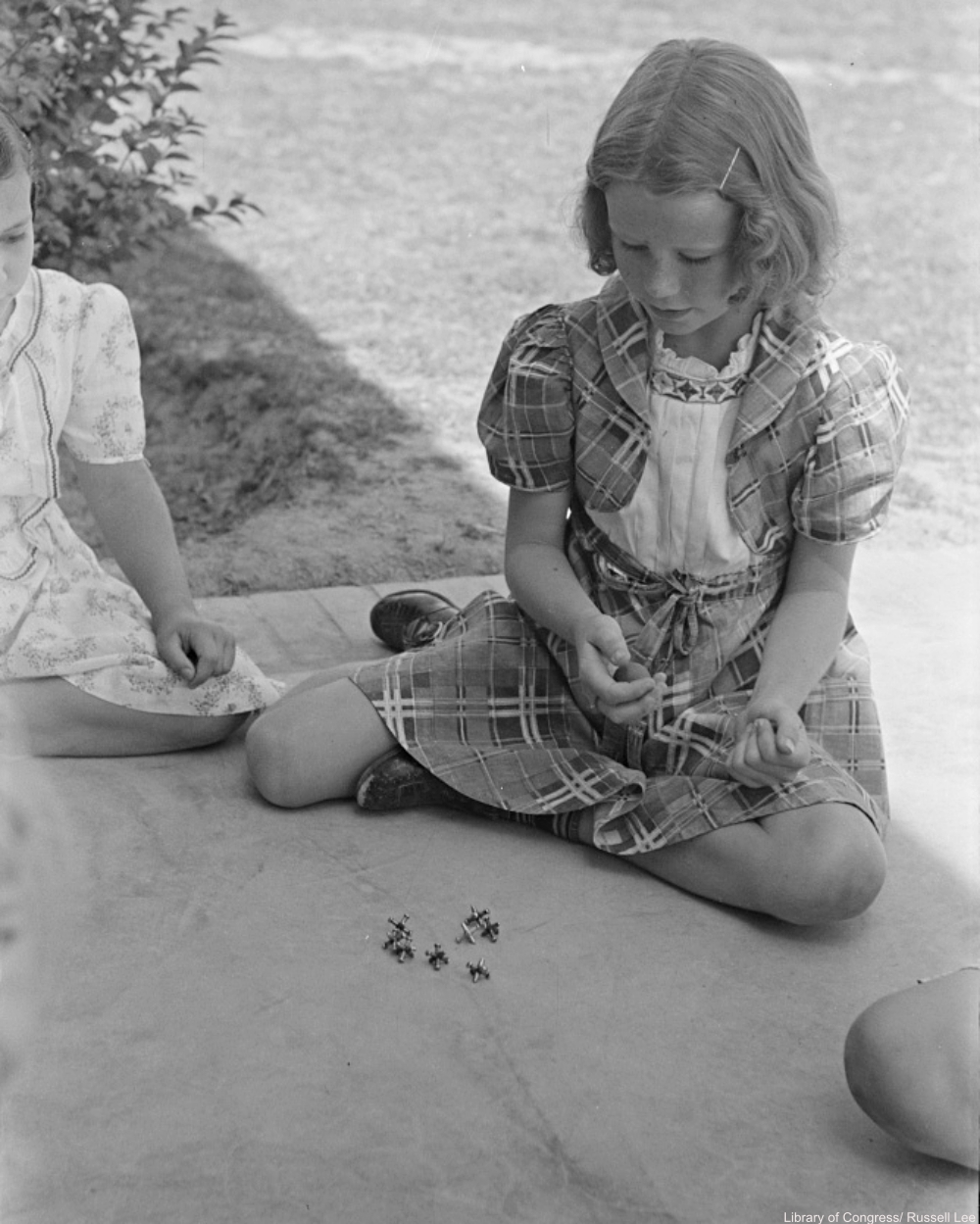 Children Playing Jacks