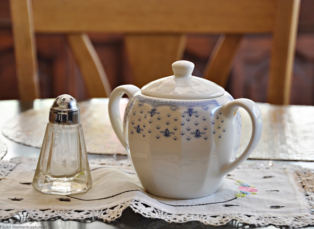 Salt Shaker and Sugar Bowl on Vintage Doilie