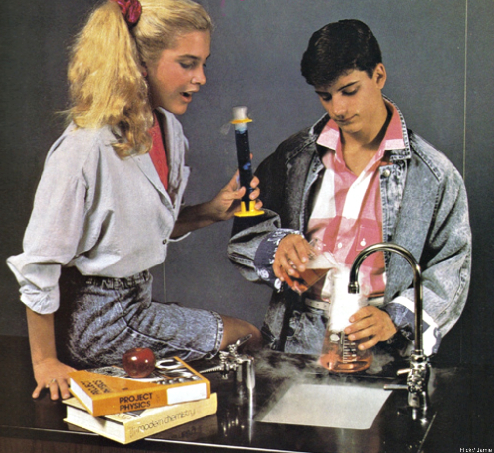 80s kids doing chemistry experiment in denim clothing