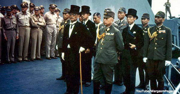 Representatives of the Empire of Japan stand aboard USS Missouri prior to signing of the Instrument of Surrender.