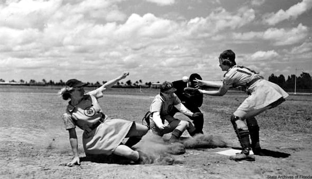 1948 Thelma Eisen, Los Angeles, Calif., slides, Vivian Kellogg, Jackson, Mich., catcher, Umpire, Norris Ward