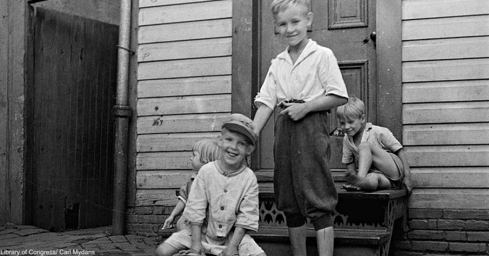 boys playing on steps 1930s