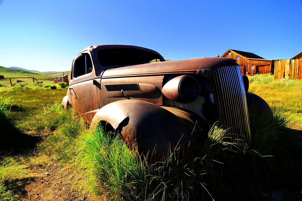 Rusty and abandoned 1937 Chevrolet coupe (photo via growing classics).