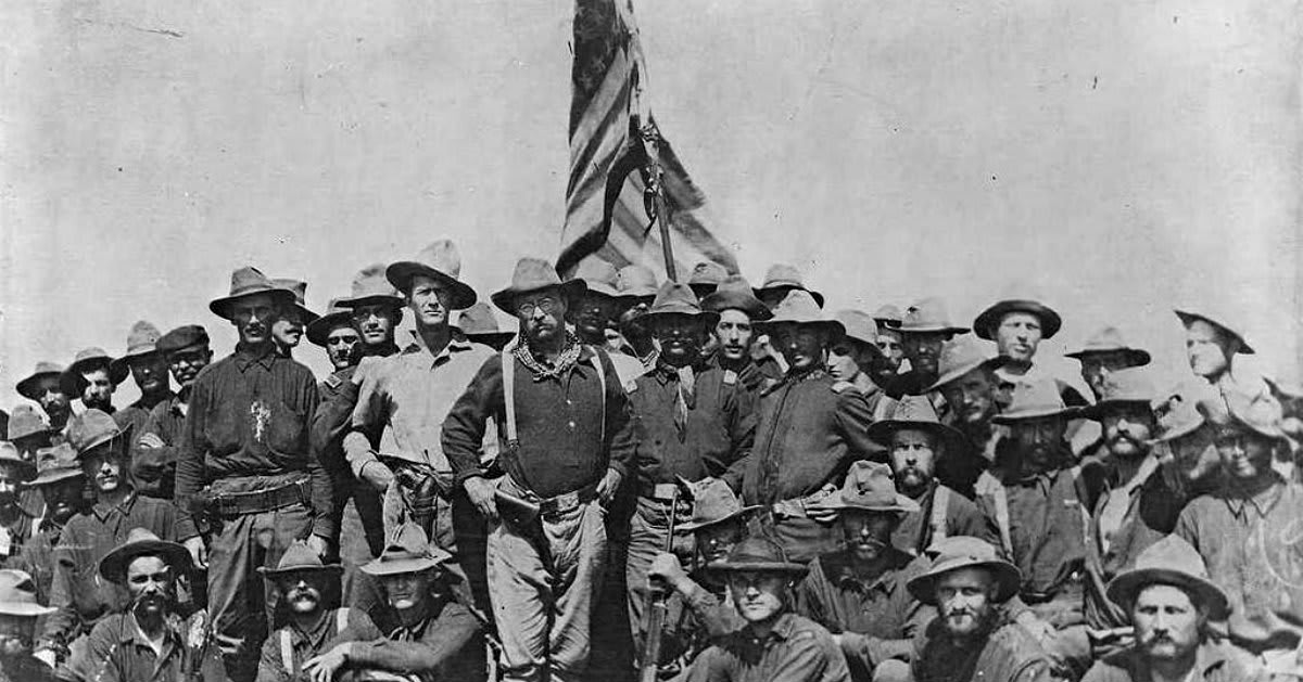 Colonel Roosevelt and the Rough Riders after capturing Kettle Hill, via Wiki Commons