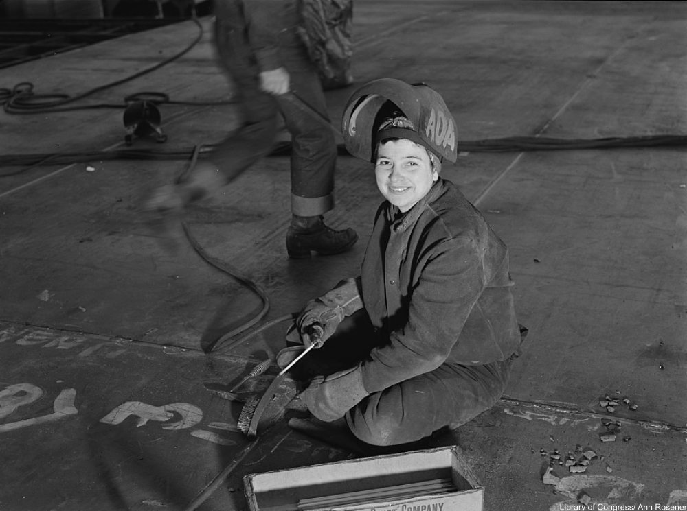 The Real Story Behind The Beloved Rosie the Riveter Poster from 1943