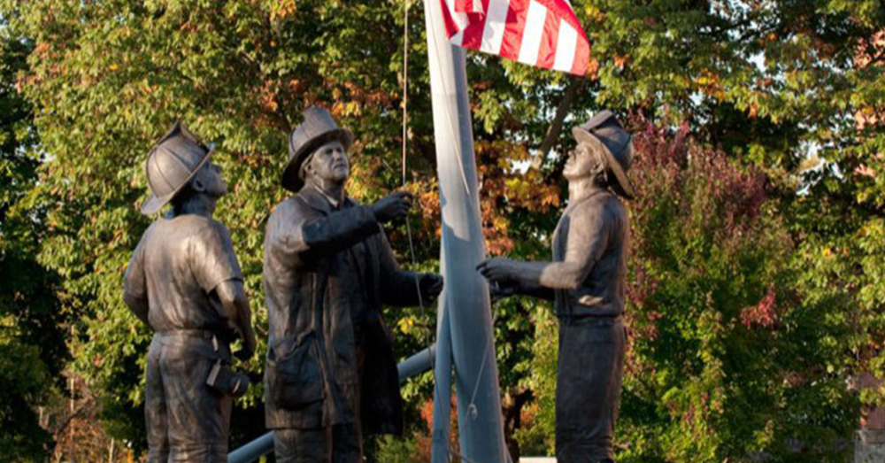 Photo: National Fallen Firefighters Foundation -- The 40-foot-tall statues are modeled after the iconic photograph by Thomas E. Franklin of firefighters raising the flag at Ground Zero.