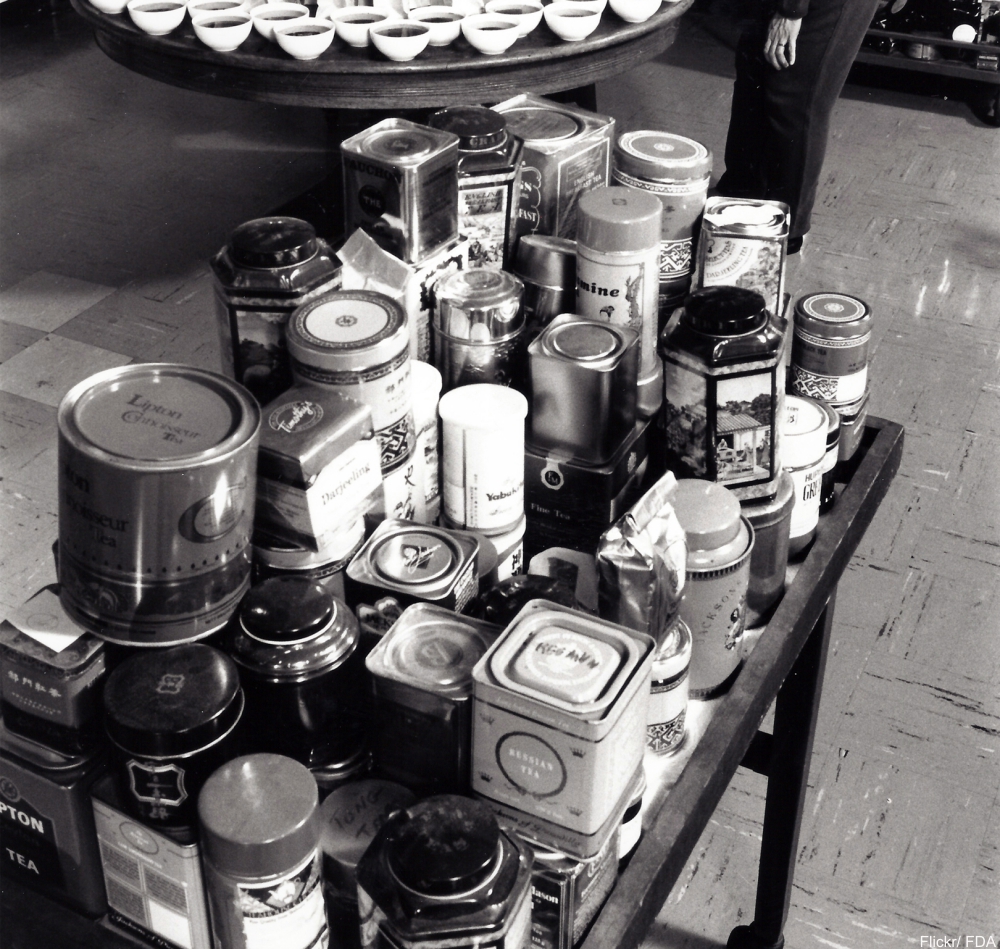 collection of tin tea caddies of all sizes