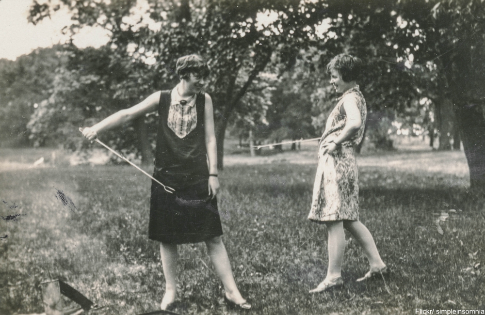 Two flappers in summer dresses