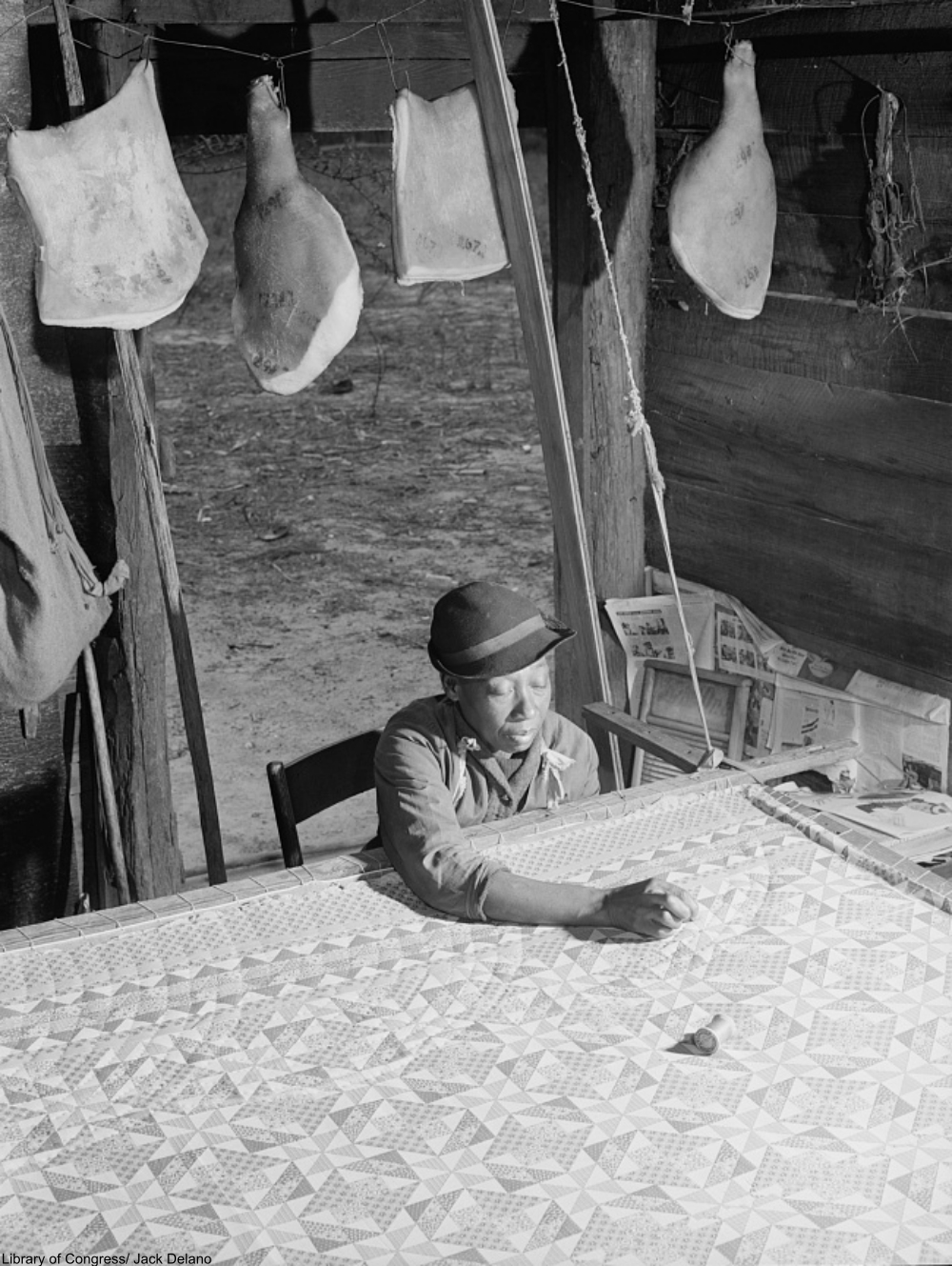quilting inside a smokehouse during the Great Depression