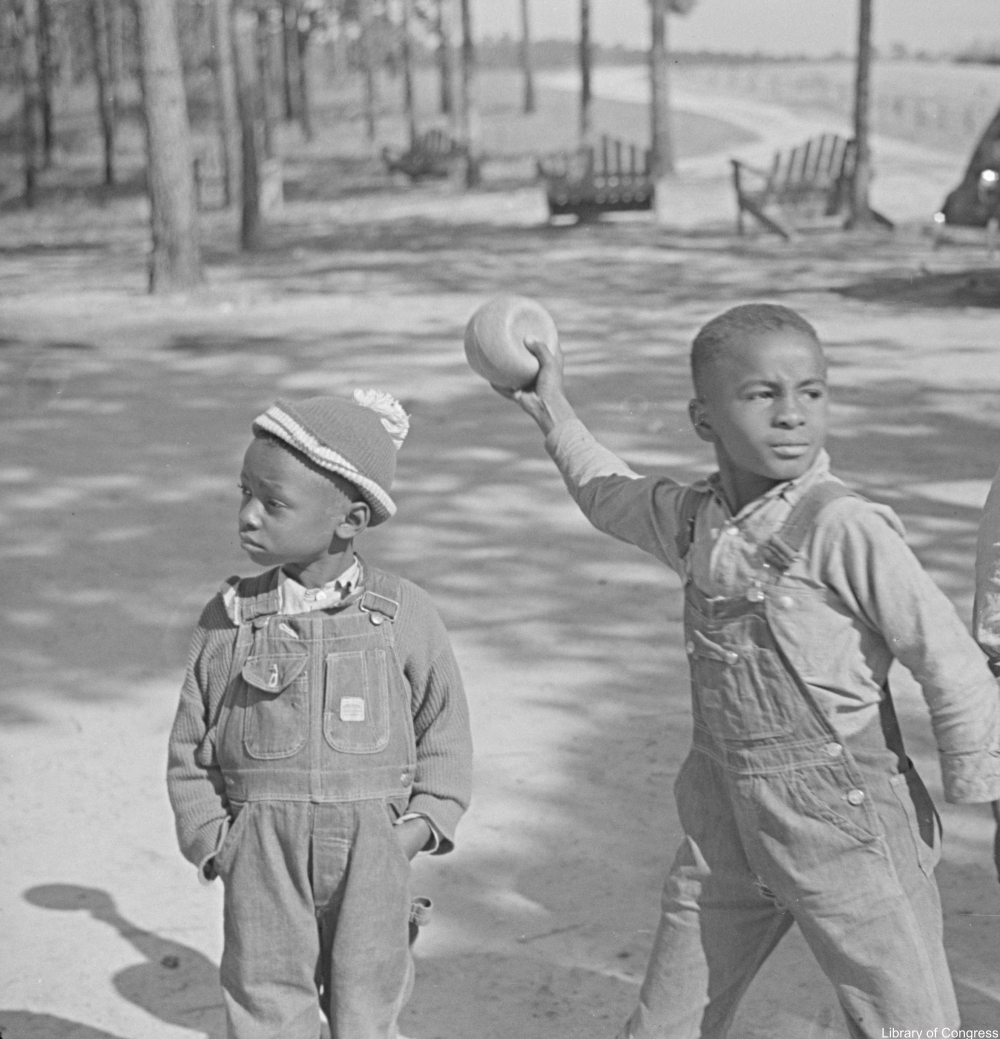 little boys playing ball 1940s