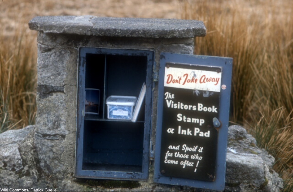 Cranmere Pool letterbox with fun sign inside.