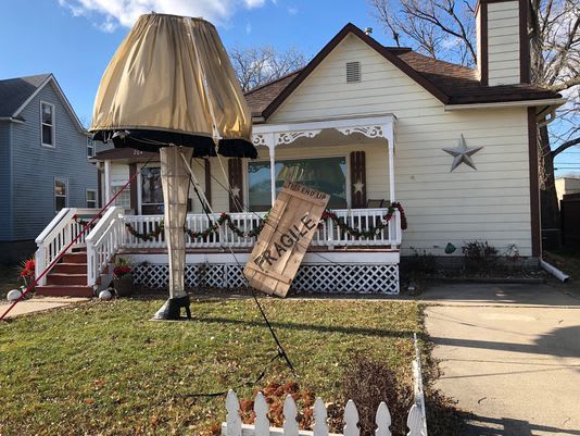 An Iowa man's front yard features a 14-foot-tall recreation of the iconic