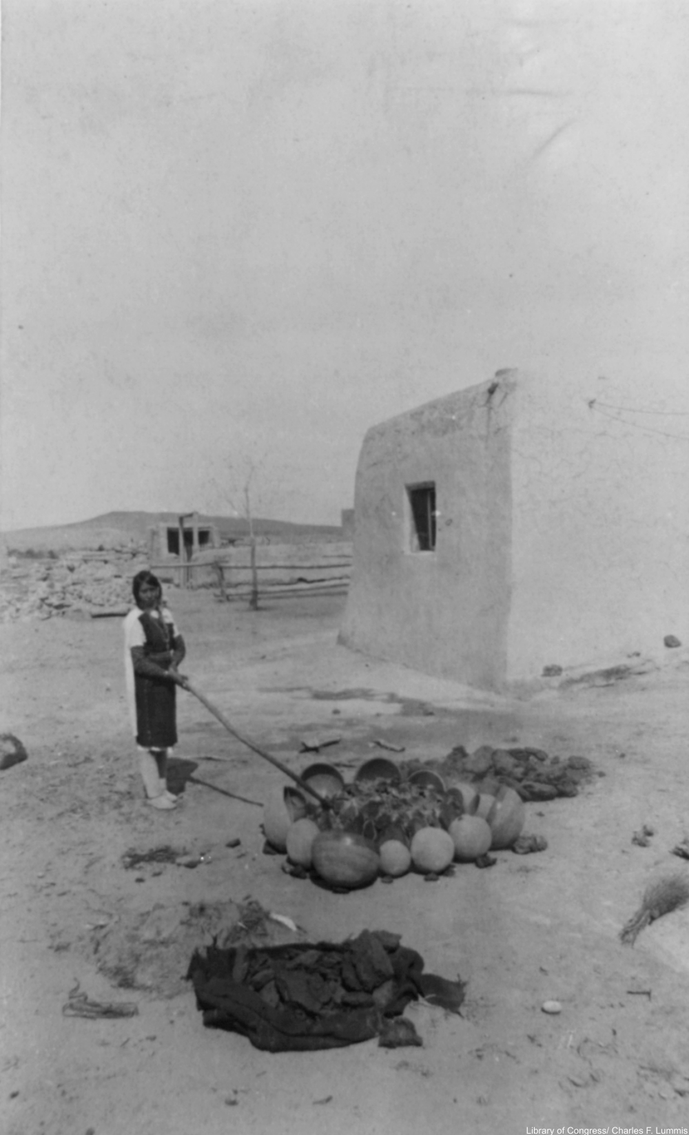 firing the pottery, 1890