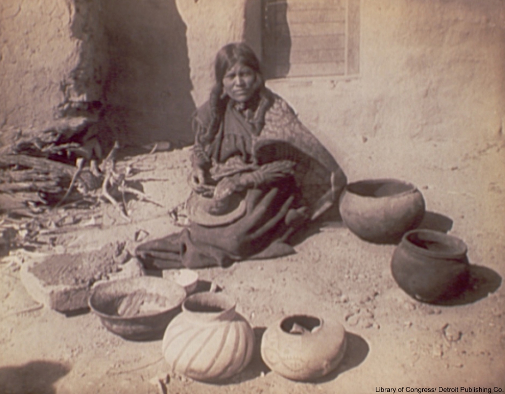 Hopi woman making pottery, circa 1900