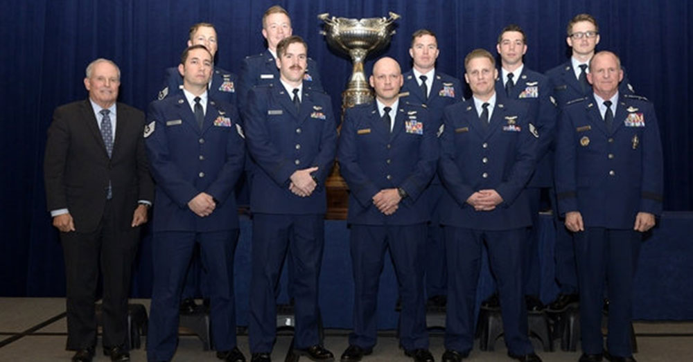 Source: U.S. Air Force The crew of Spooky 43, the AC-130U gunship, are joined by Air Force Vice Chief of Staff Gen. Stephen Wilson, right, and retired Lt. Gen. Stephen Wood, left, after they were awarded the Mackay Trophy Thursday. (Staff Sgt. Rusty Frank/Air Force)