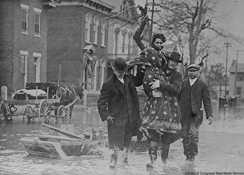 Rescuing a woman in her bathrobe in the Flood of 1913, Dayton, Ohio