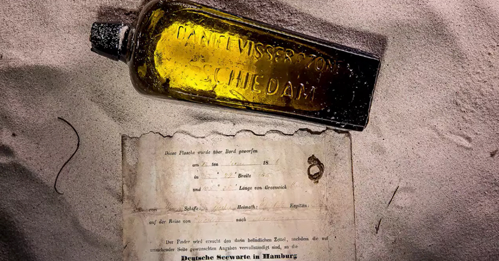 Screenshot: YouTube/Kym Illman -- This Dutch gin bottle with a note inside was found after being sent adrift by a German vessel in 1886.