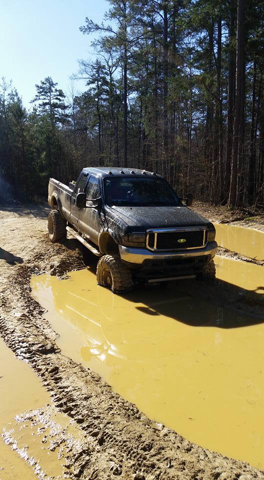 From Todd O'neal Price: 2001 f250 sitting on 38 nittos 12 in lift v10 skyjacker suspension