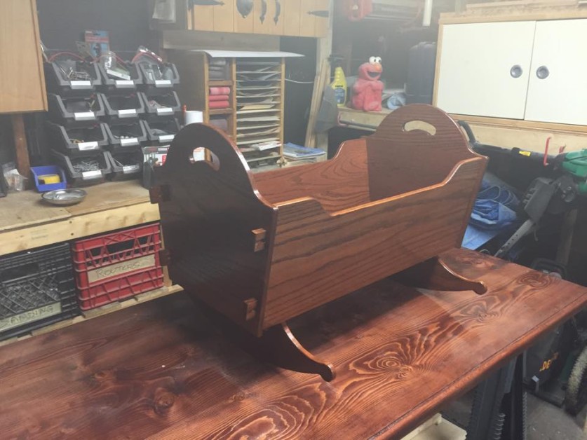 From Andrew Sheehan: Rocking cradle I made for my second son, due end of December 2015. End-joined oak, mission oak stain, semi-gloss Varathane.