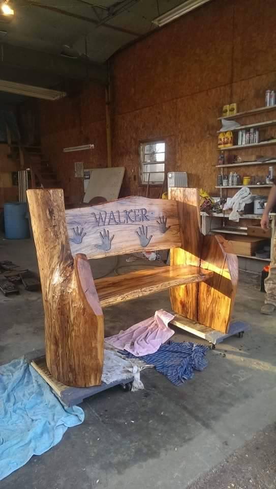 From Becca Walker: My boyfriend made this bench for my parents from an old oak tree. The hand prints are mine, my sister and my two boys.
