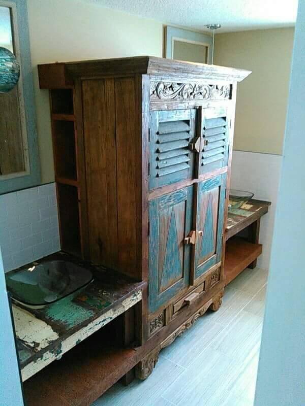 From Jay Forget: Morocken cabinet and dinning room table, converted to a his and hers bath room vanity...