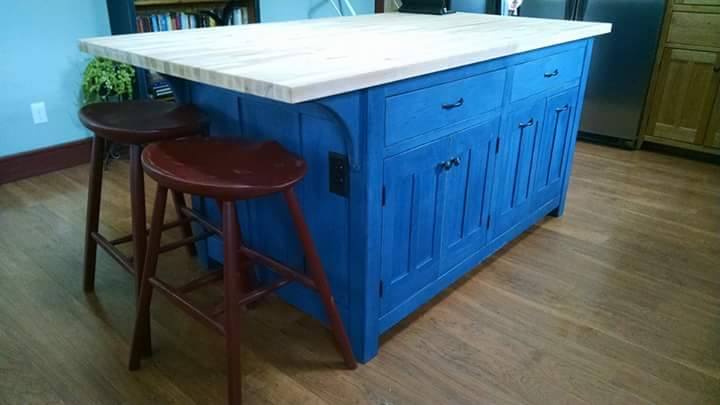 From Judd Kaiser: Kitchen island and tractor-seat stools.