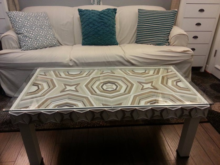 From Bethany Burkhardt: I initially was inspired by a wedding photo of a beautiful door for the combined shapes of octagons and stars using trim pieces from the home improvement store. I wanted to make a coffee table rather than a wall art piece all along. This project started out in May 2011 and I spent a few weekends on it before I went back to school for my doctorate. Then 5 years later (and graduating) I finally had time to finish!