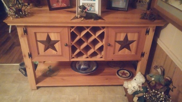 From James Hill: Milled down rough cut 4×6 California White Cedar to make this buffet. Built from looking at a picture on google, but added the stars because my wife loves country stars.