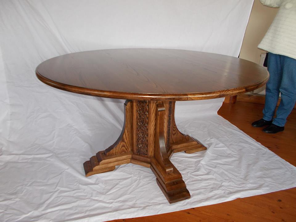 From Paul Griffiths: Here is a table with Celtic Knot carving on the octagonal base.It's made from stained ash.From Waterford Ireland