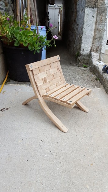 From Robin Stapleton: i made an oak seat for my daughters 1st birthday. I made it from an off cut of oak kitchen worktop i had left over from a job.i made the legs by cutting 3mm strips then glueing together and clamping on a jig i made.Realy happy how it turned out, she loves it smile emoticon