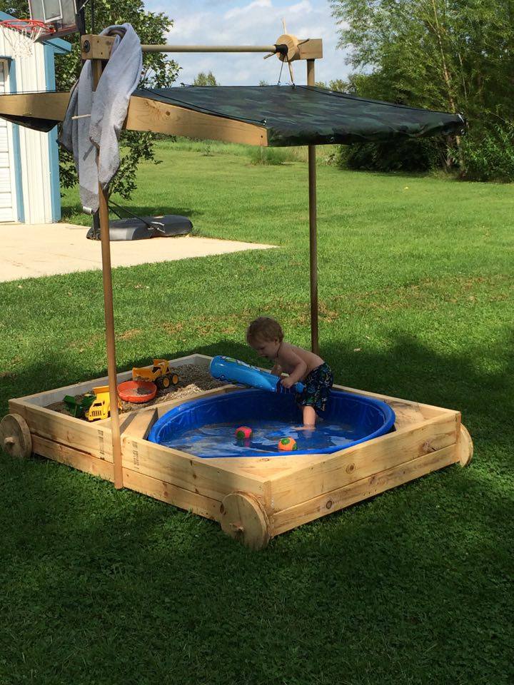 From Bill Beck: I call it my grandsons party wagon. It's a sandbox/kiddie pool with a retractable canopy to keep him out of the sun and it's on wheels so I can roll it around the yard and not kill the grass