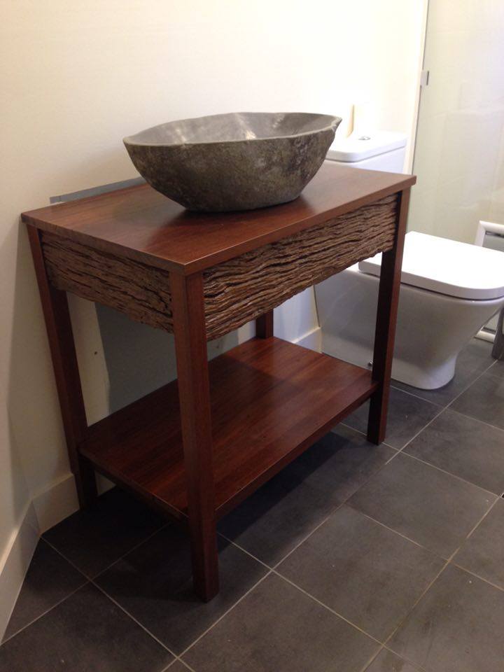 From Brad Davies: Made a vanity out of a 8 x 8 fence post, some jarrah flooring and s verandah post.