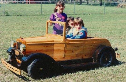 From Jeff Jackson: Built entirely out of scrap wood and planked with cypress, this little hot rod sported a rolled and pleated interior, working headlights, and working brakes. All powered by a weed eater motor. No plans for this, I simply used an old 1/24 scale model cat kit that was lying around and scaled it up to 1/2 size.