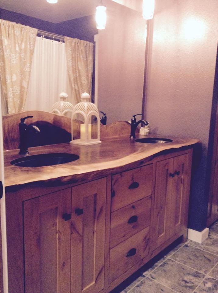 From Wade Sims: New bathroom vanity. Walnut slab top and knotty alder base cabinet.