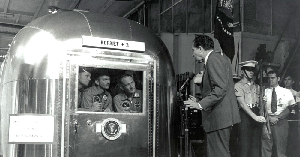 President Nixon talks to the crew of Apollo 11 from outside of their Airstream / Via NASA