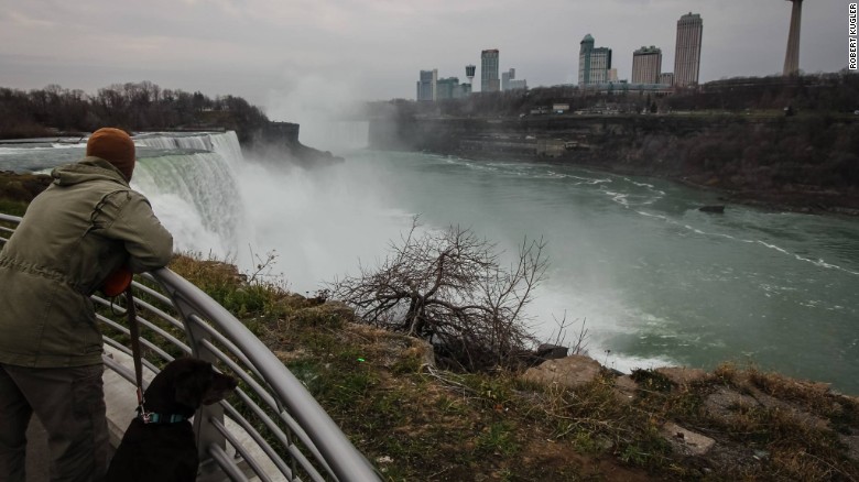 Kugler and Bella watching the water flow at Niagara Falls. (Credit: Robert Kugler)