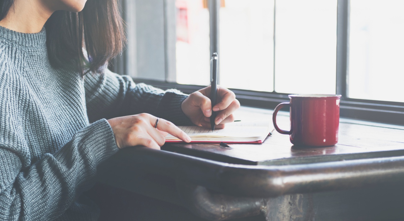 Asian Lady Writing Notebook Diary Concept
