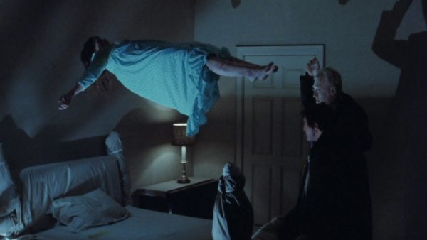 A possessed Regan floats over her bed in the classic film