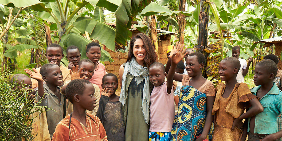 Meghan Markle, pictured (center) while leading a volunteer Clean Water Campaign in Rwanda, 2015. | Photo courtesy of Artists' Collective Canada.