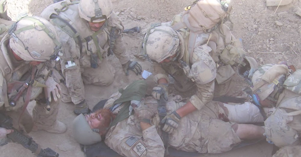 Source: YouTube/FOX 13 News Utah Logie was critically injured by a mine. He credits Balto for saving his life.