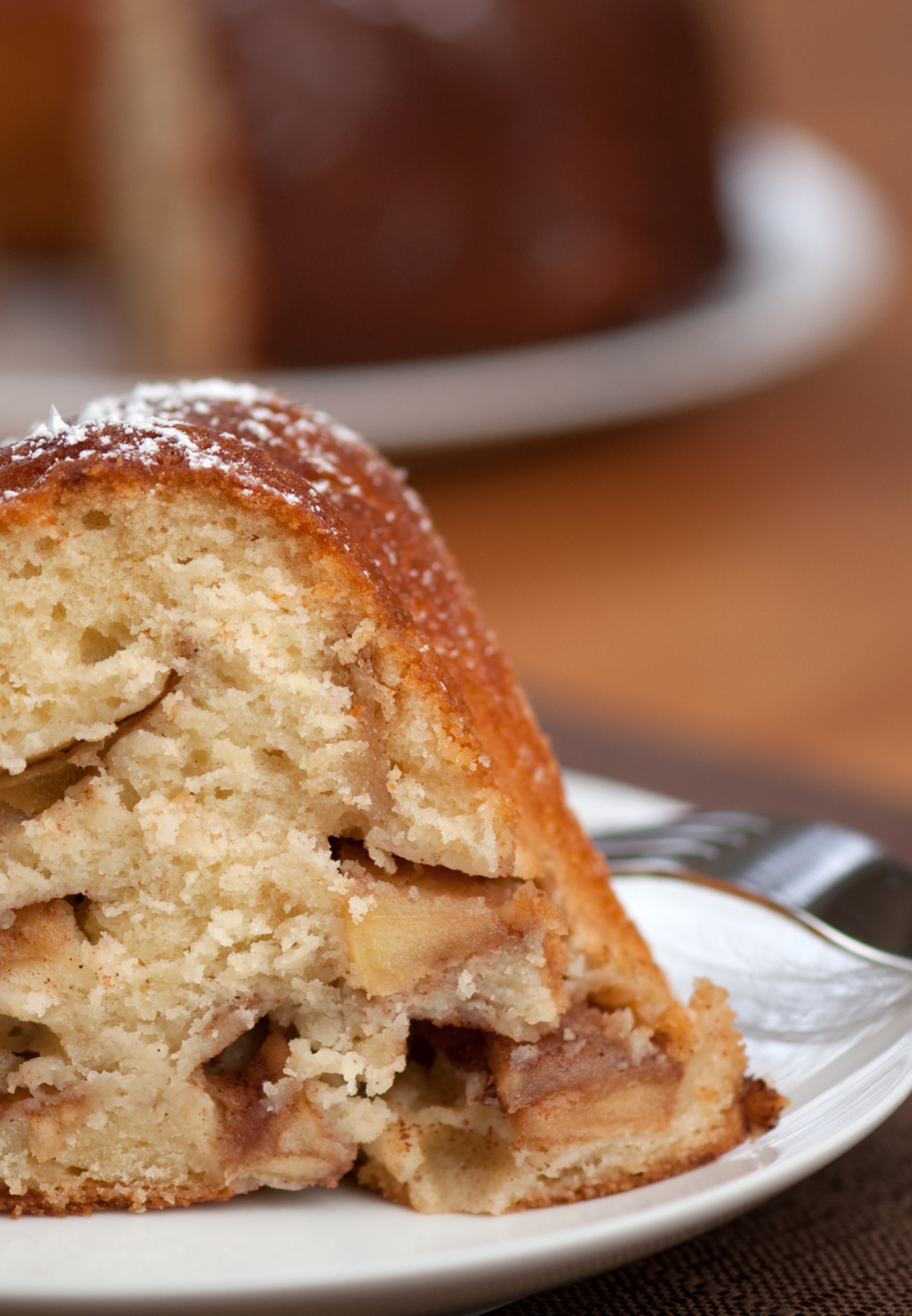 Close up view slice of apple bundt cake