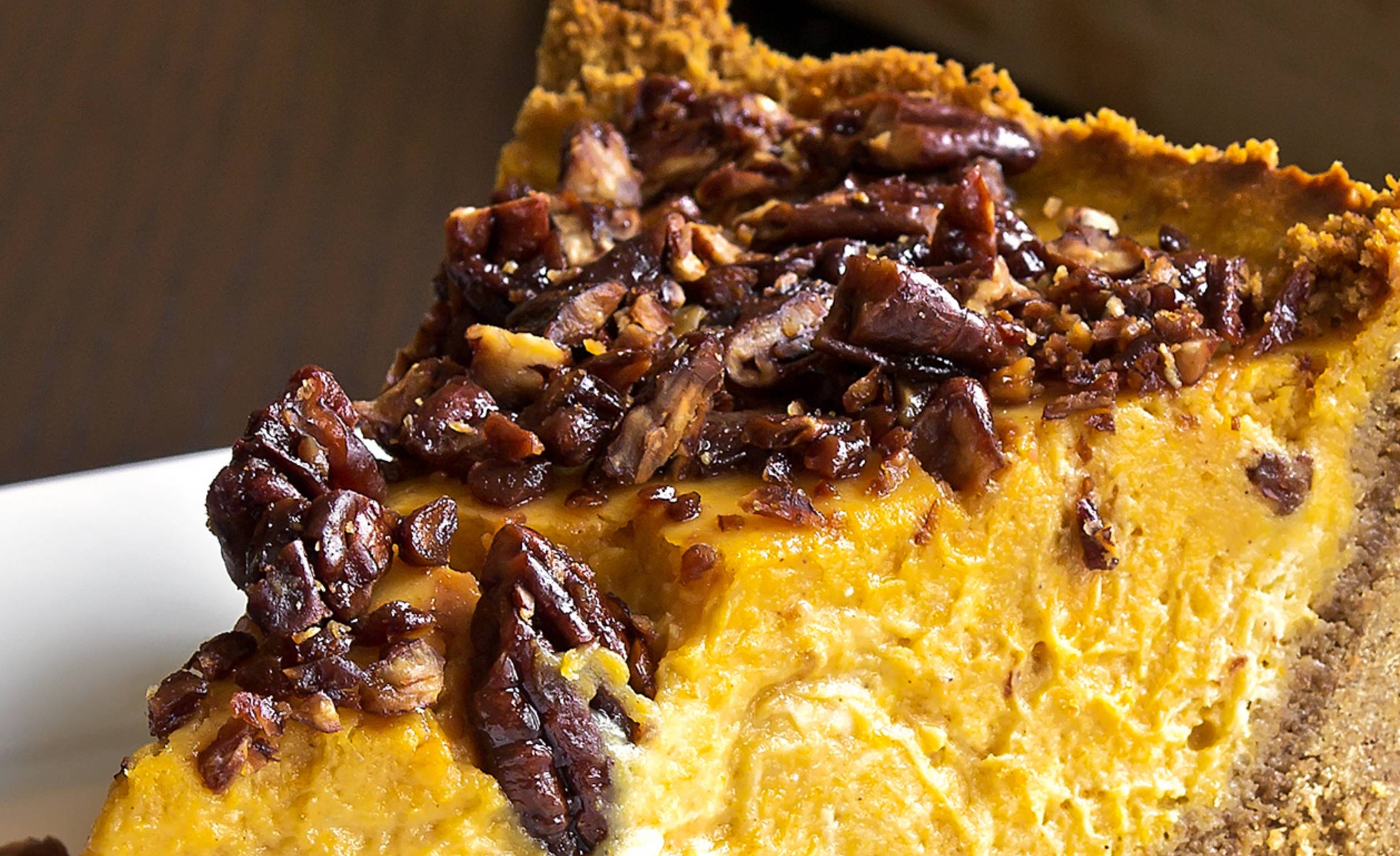 Pumpkin Cheesecake With Caramelized Pecan Topping 12 Tomatoes